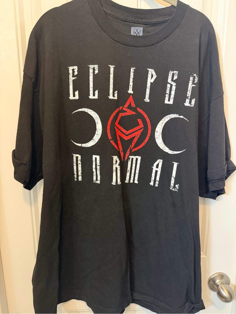WWE Black Ember Moon Graphic Tee with Red Emblem